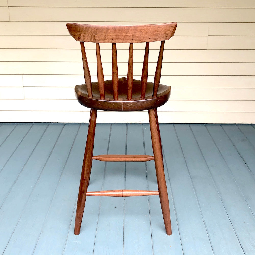 This is a black walnut 25" high stool, +11" back, designed for kitchen counter, kitchen island.