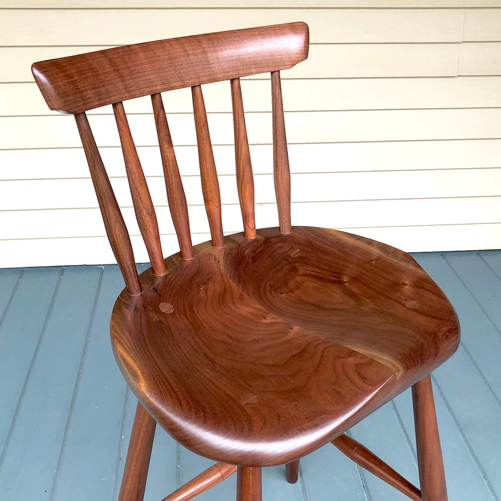 This is a black walnut 25" high stool, +11" back, designed for kitchen counter, kitchen island.