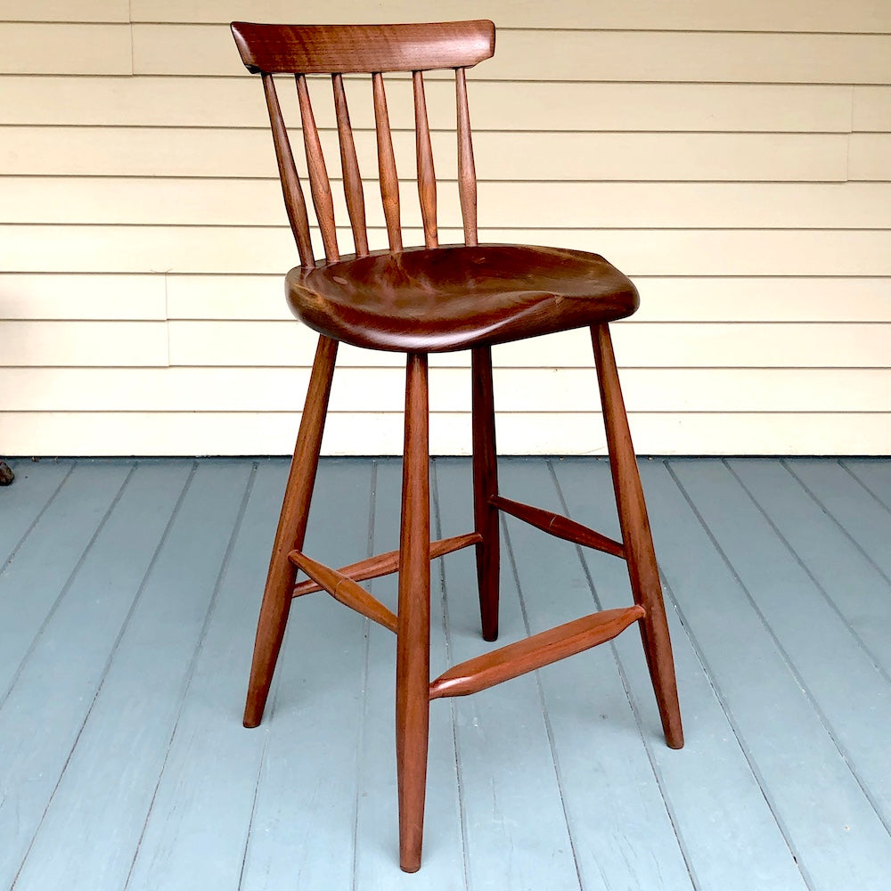 This is a black walnut 25" high stool, +11" back, designed for kitchen counter, kitchen island.