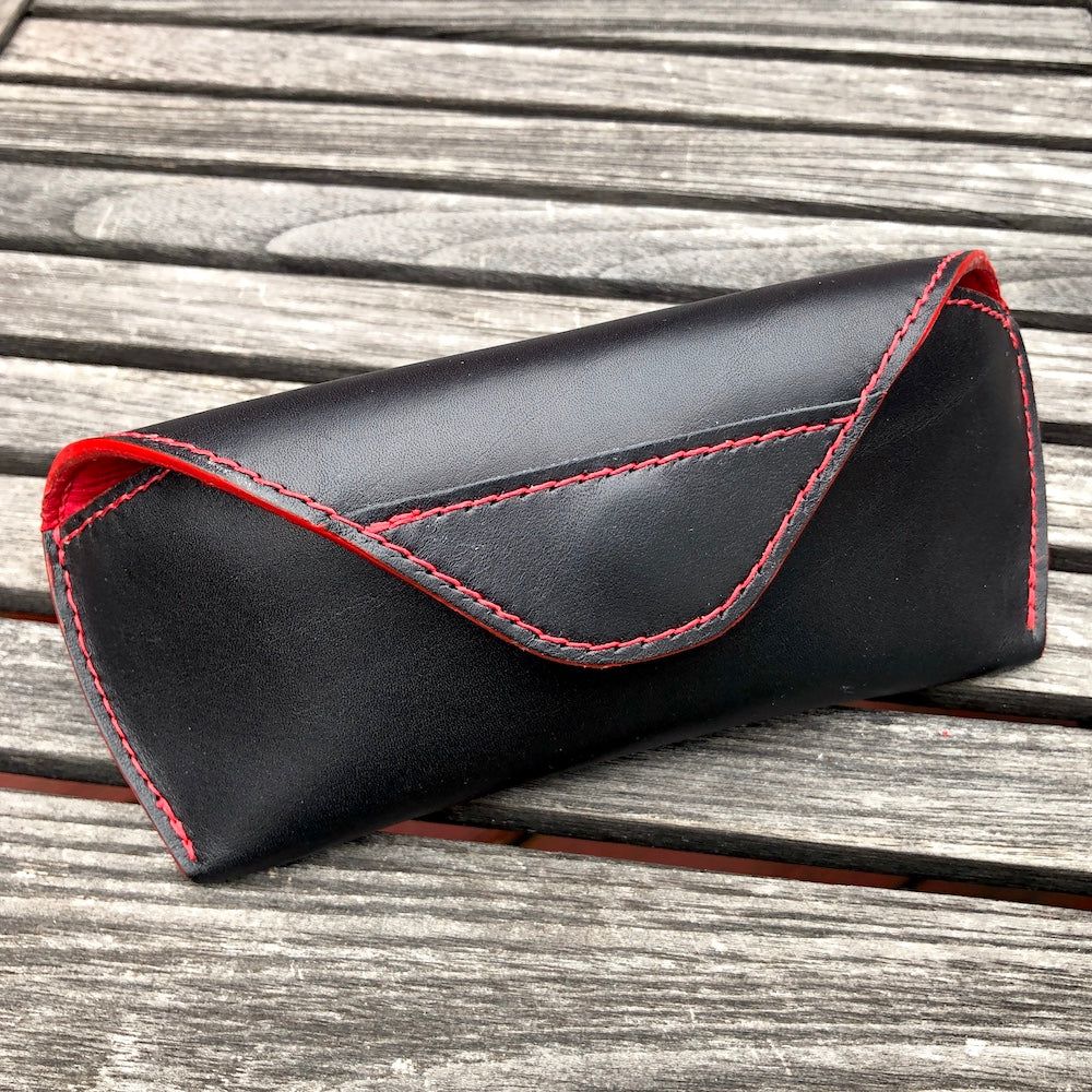 U.S. sourced, saddle stitched cowhide leather case with deerskin lining for prescription eyeglasses and sunglasses. Handcrafted protective case for eyeglasses and sunglasses with magnetic clasp, unisex.