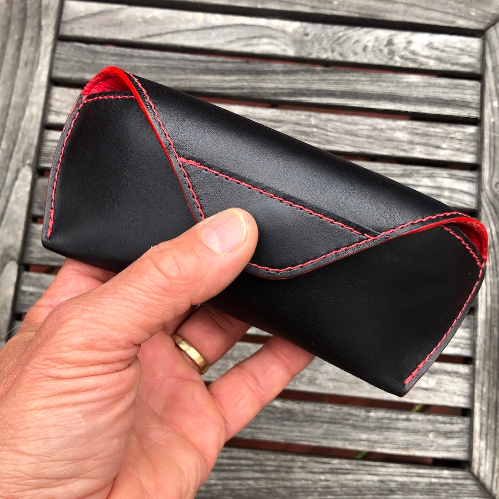 U.S. sourced, saddle stitched cowhide leather case with deerskin lining for prescription eyeglasses and sunglasses. Handcrafted protective case for eyeglasses and sunglasses with magnetic clasp, unisex.