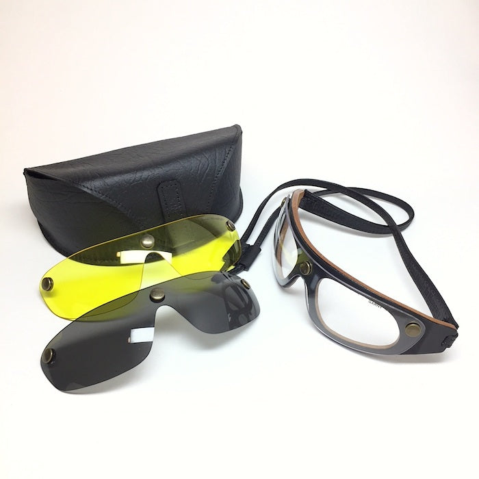 Sunglasses with 3 lenses, black leather frame, leather riding goggles.