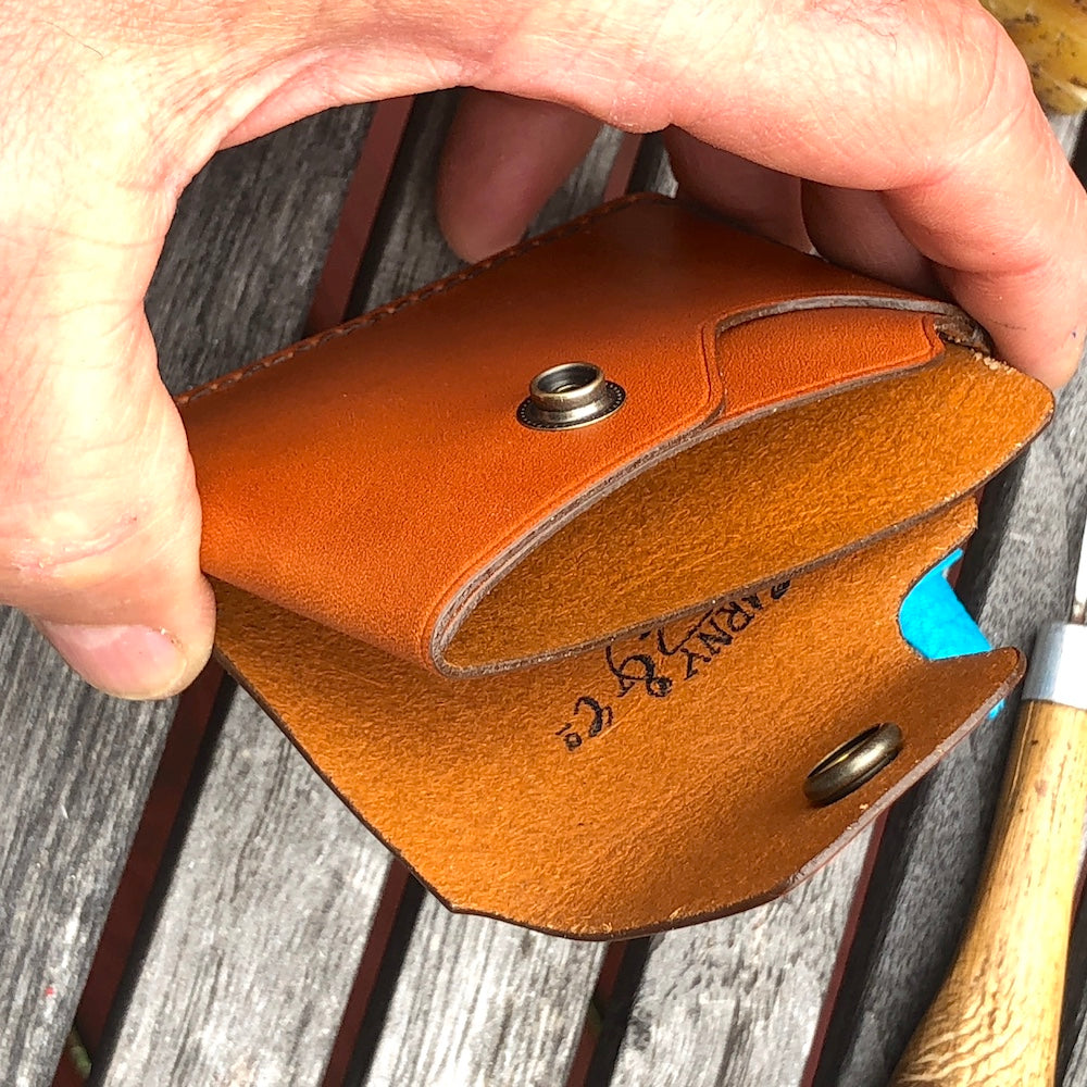 Handcrafted wallet from vegetable dyed cowhide. The edge is coated and polished. Perfect fit for any pocket, front or back, tight or loose, without bulk. It will hold credit cards, drivers license, cash, etc. in 3 compartments.