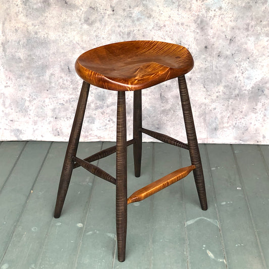 This is a 25" high stool, designed for kitchen counter, kitchen island.<br data-mce-fragment="1">Hand carved from solid tiger maple wood following the anatomical curves of the human body. <br data-mce-fragment="1">No pressure points, the whole surface of the stool will support the upper body.