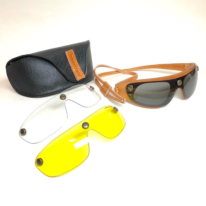 Sunglasses with 3 lenses, black leather frame, leather riding goggles.