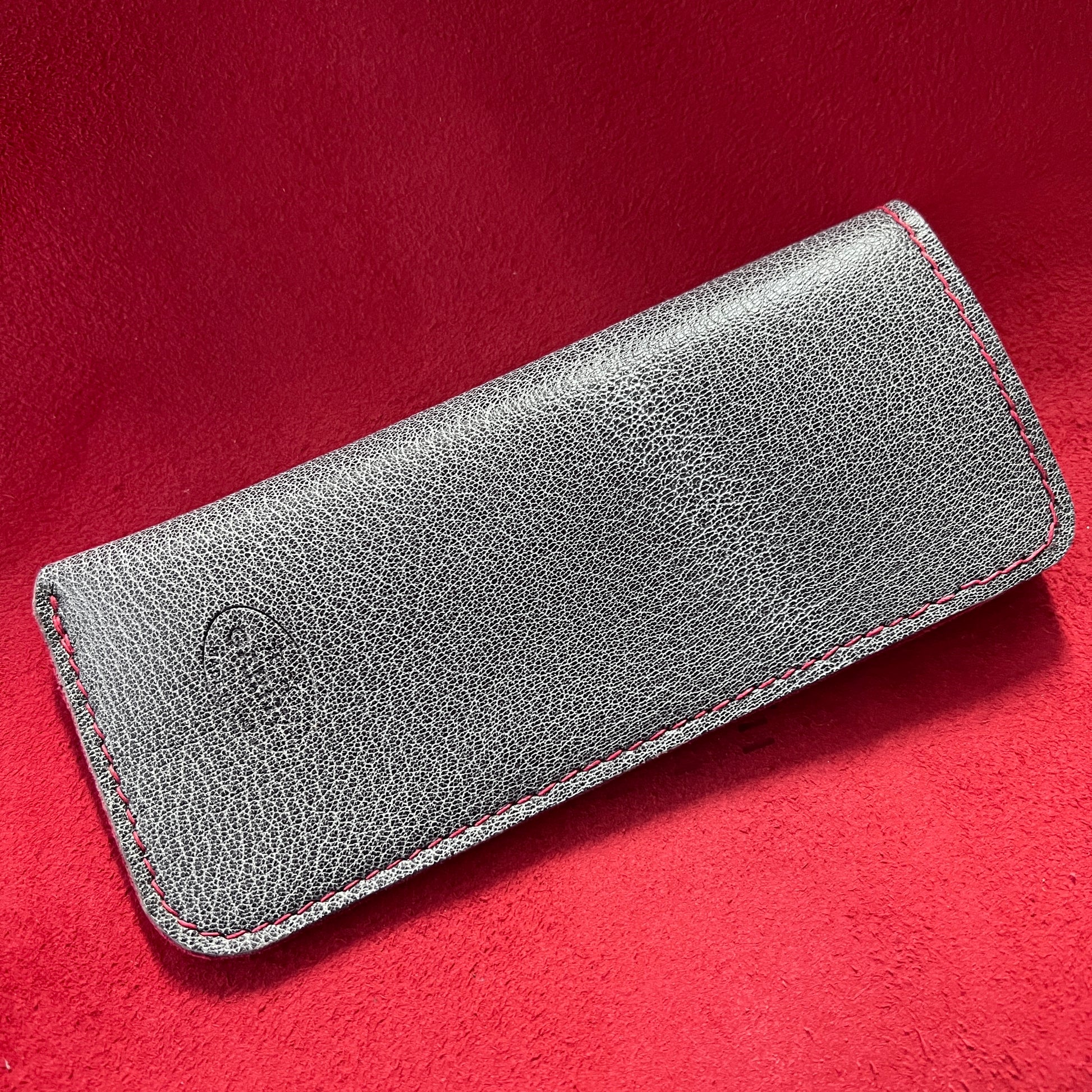 Handcrafted eyewear sleeve. Silver gray goatskin leather Rx eyewear case with red deerskin lining. 