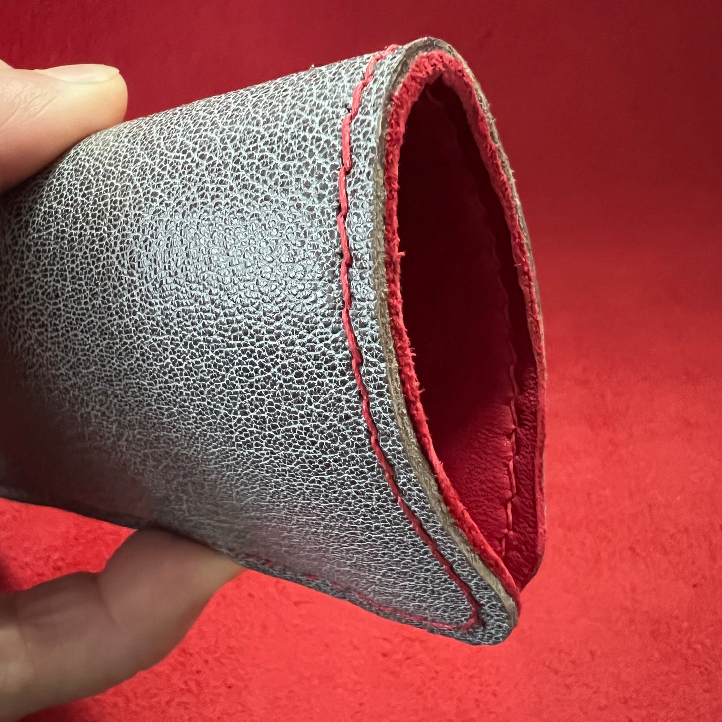 Handcrafted eyewear sleeve. Silver gray goatskin leather Rx eyewear case with red deerskin lining. 