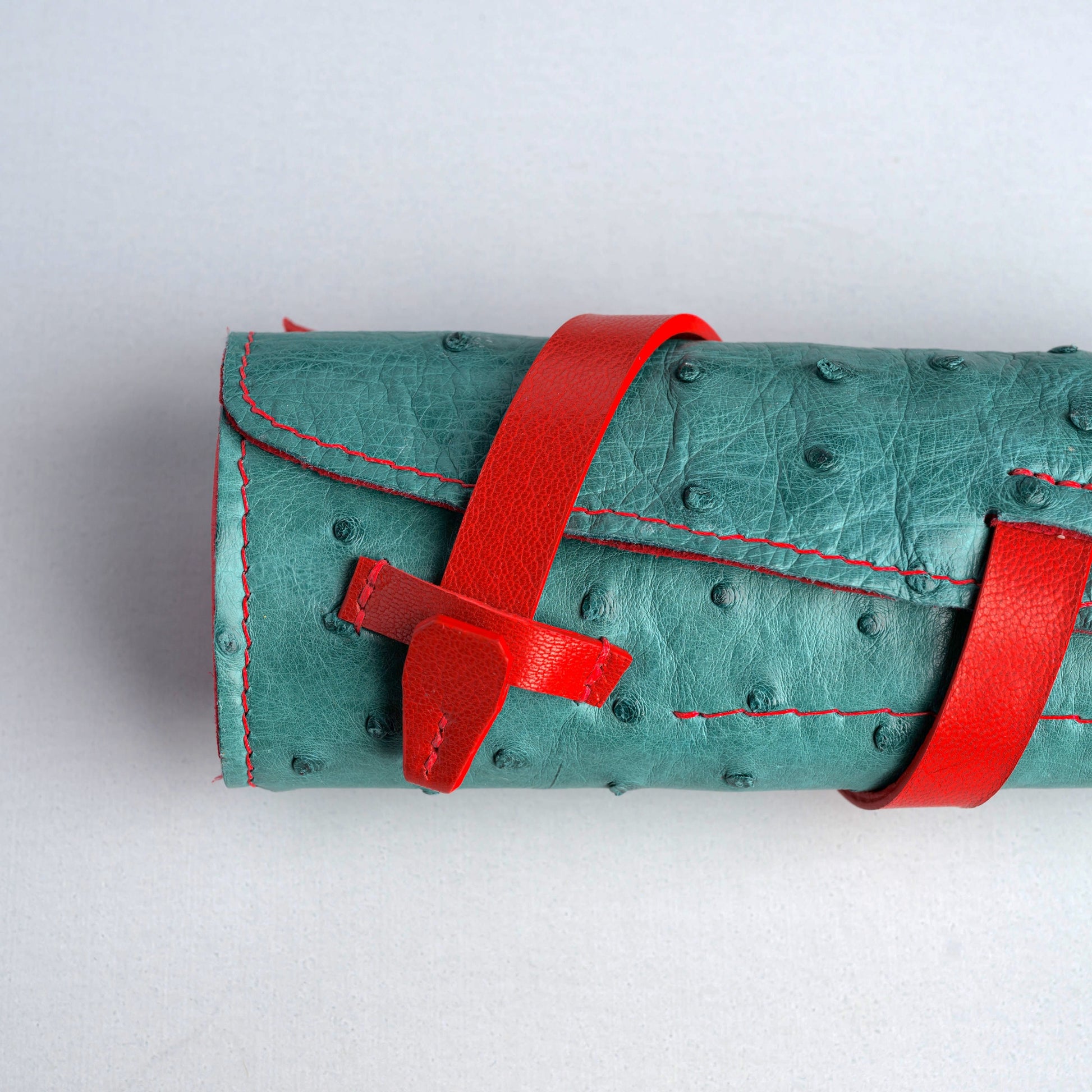 Handcrafted pen case. Ostrich leather outside, deerskin inside pen roll, fountain pen wrap. Hand cut and hand stitched.  