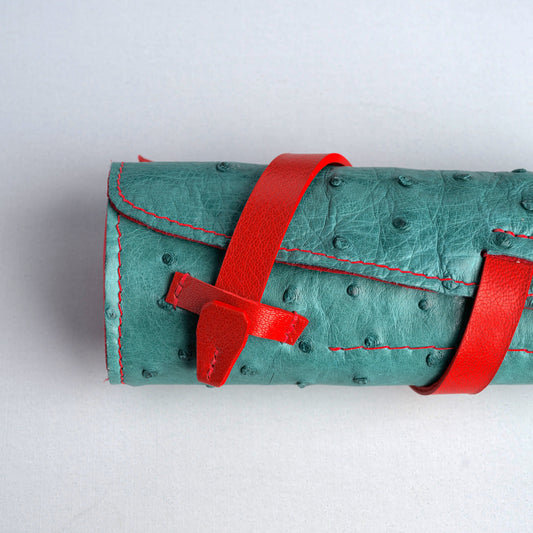 Handcrafted pen case. Ostrich leather outside, deerskin inside pen roll, fountain pen wrap. Hand cut and hand stitched.  
