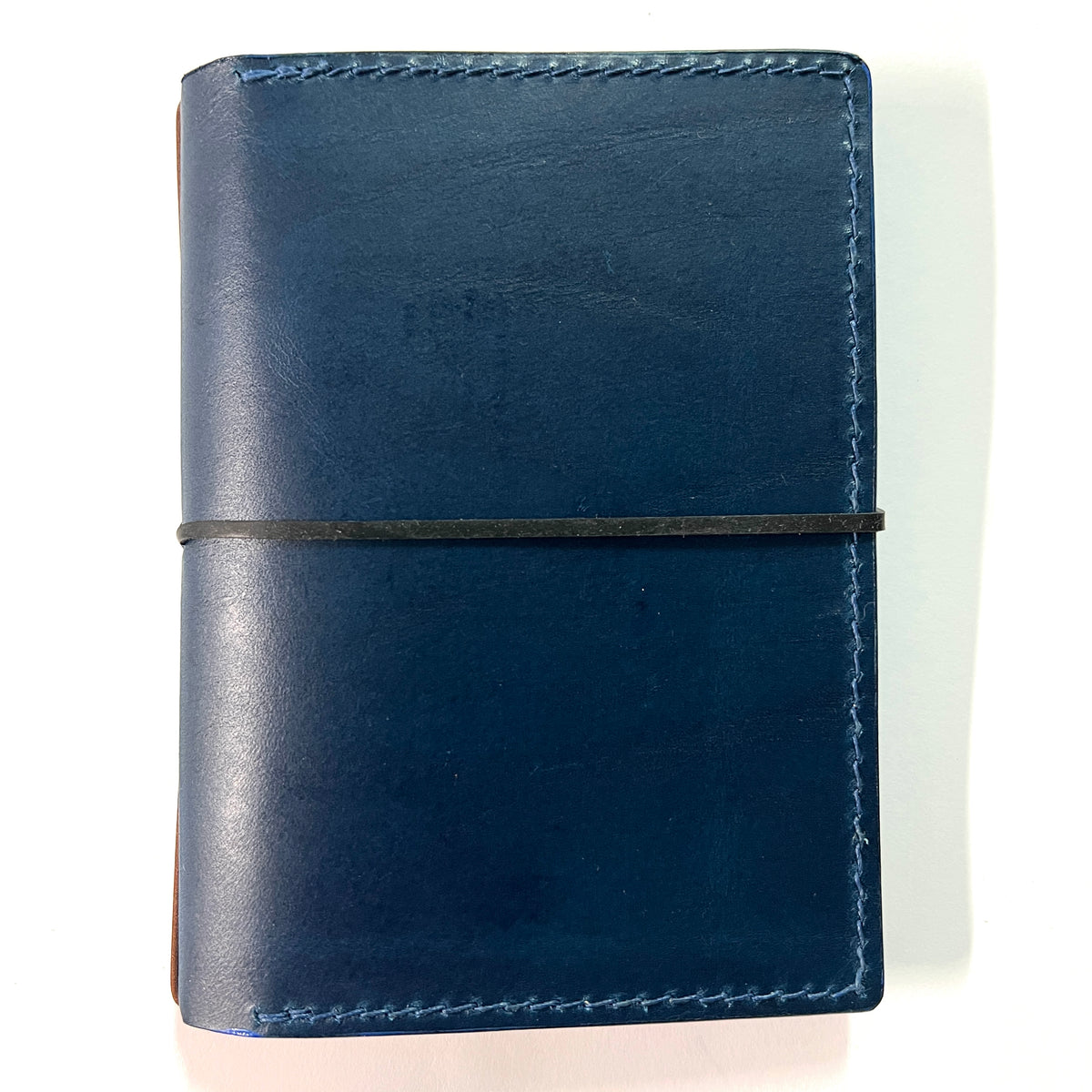 Cowhide leather Passport size Travelers Journal cover.  Hand stitched, finished edges. One Midori Travelers Notebook Journal included.  