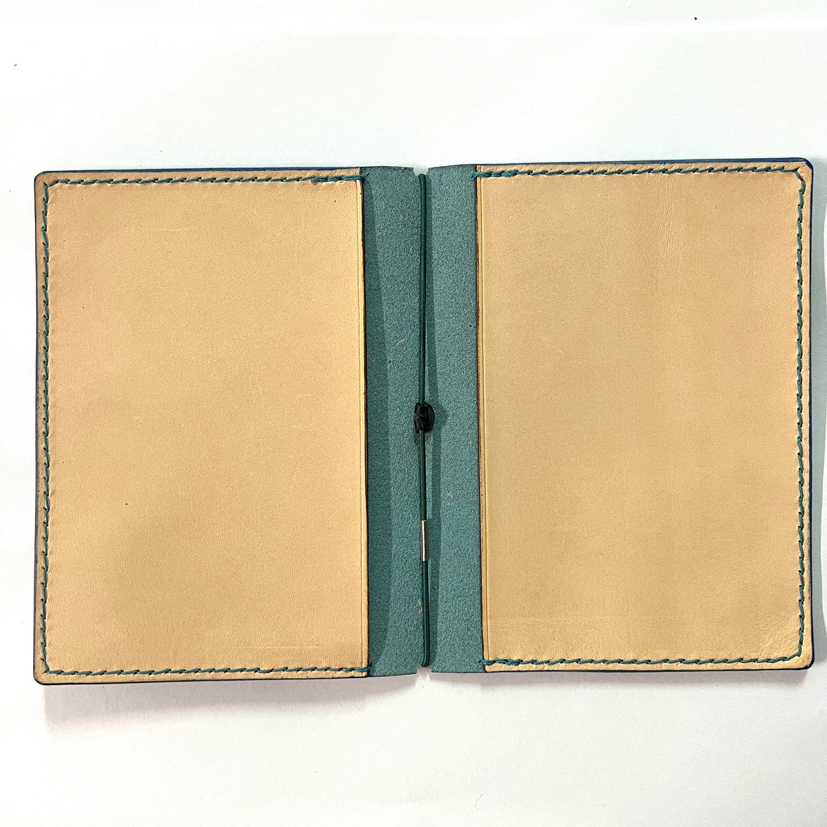 Cowhide leather Passport size Travelers Journal cover.  Hand stitched, finished edges. One Midori Travelers Notebook Journal included.  